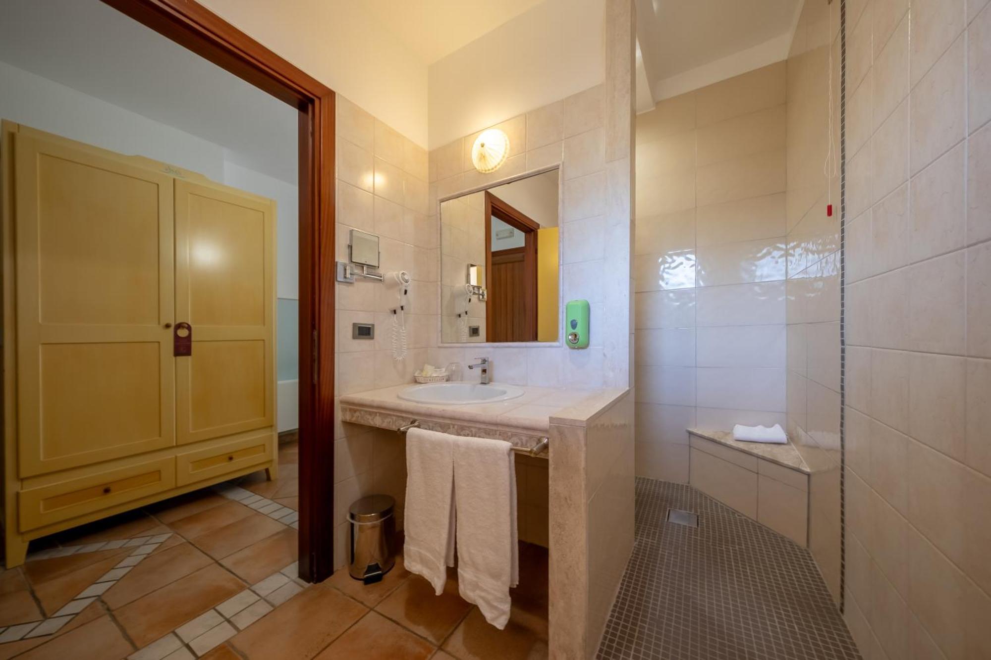 Hotel Luci Del Faro Калазетта Экстерьер фото