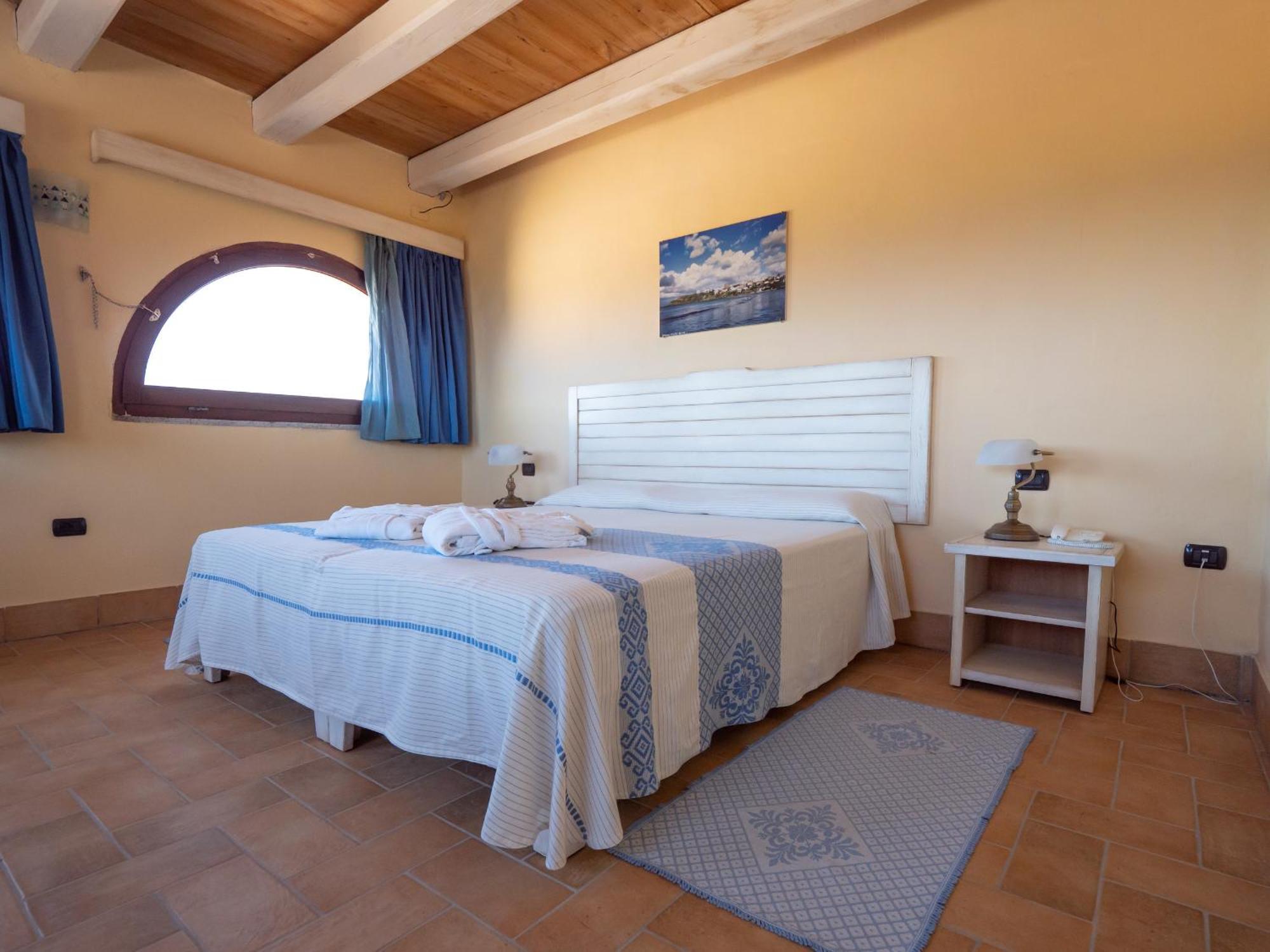 Hotel Luci Del Faro Калазетта Экстерьер фото